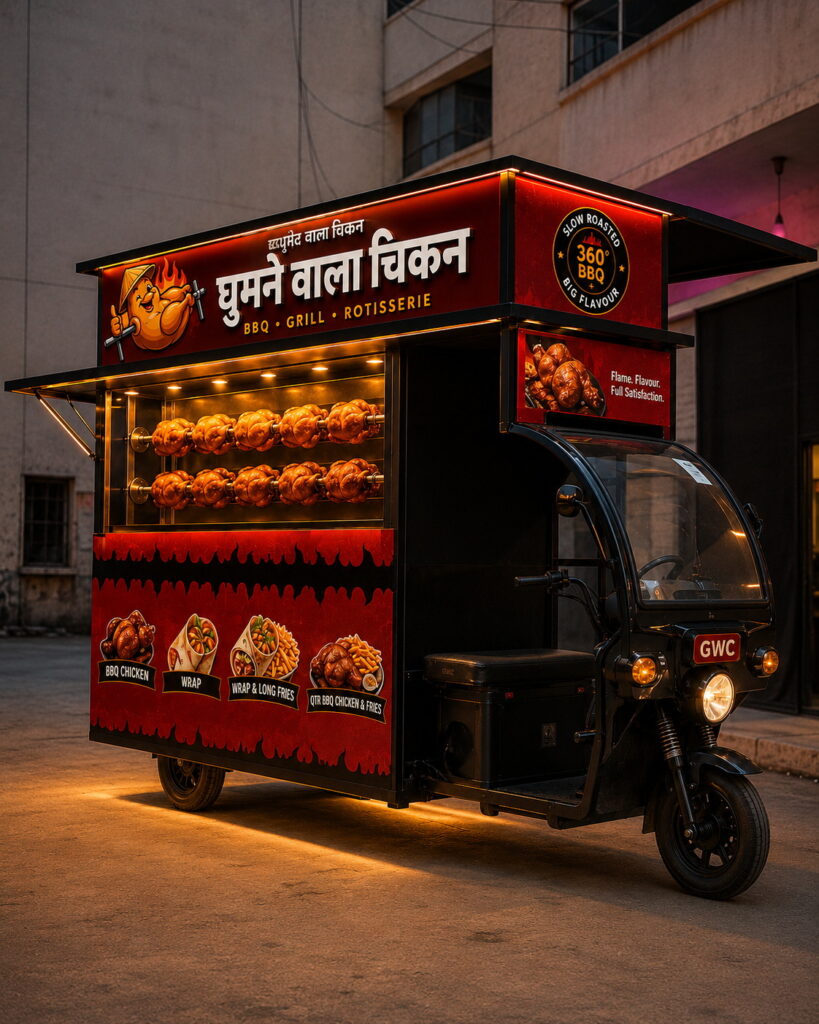 A premium branded Ghumne Wala Chicken rotisserie food cart parked on an urban street at dusk, featuring glowing warm lights, a black and red BBQ-themed design, rotating roasted chickens inside a glass display, and bold Hindi signage showcasing BBQ, Grill, and Rotisserie offerings. The eco-modern food truck has cinematic lighting, rustic textures, and a luxury street-food aesthetic.